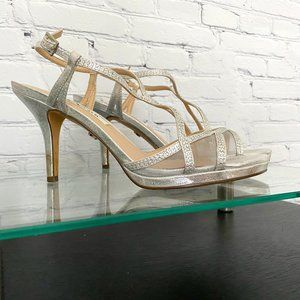 Nina silver sparkly french heel dress shoe.